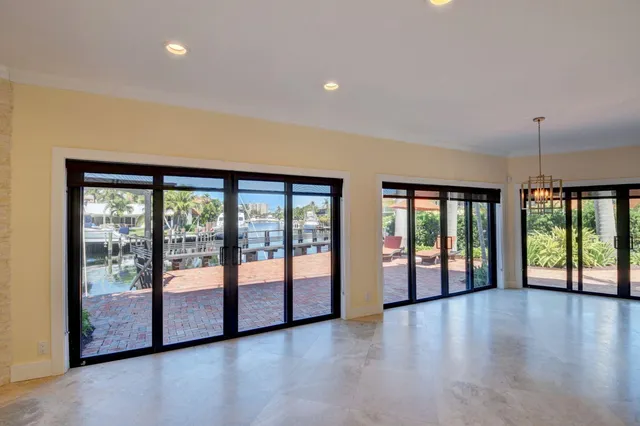 a view of an entryway with wooden floor
