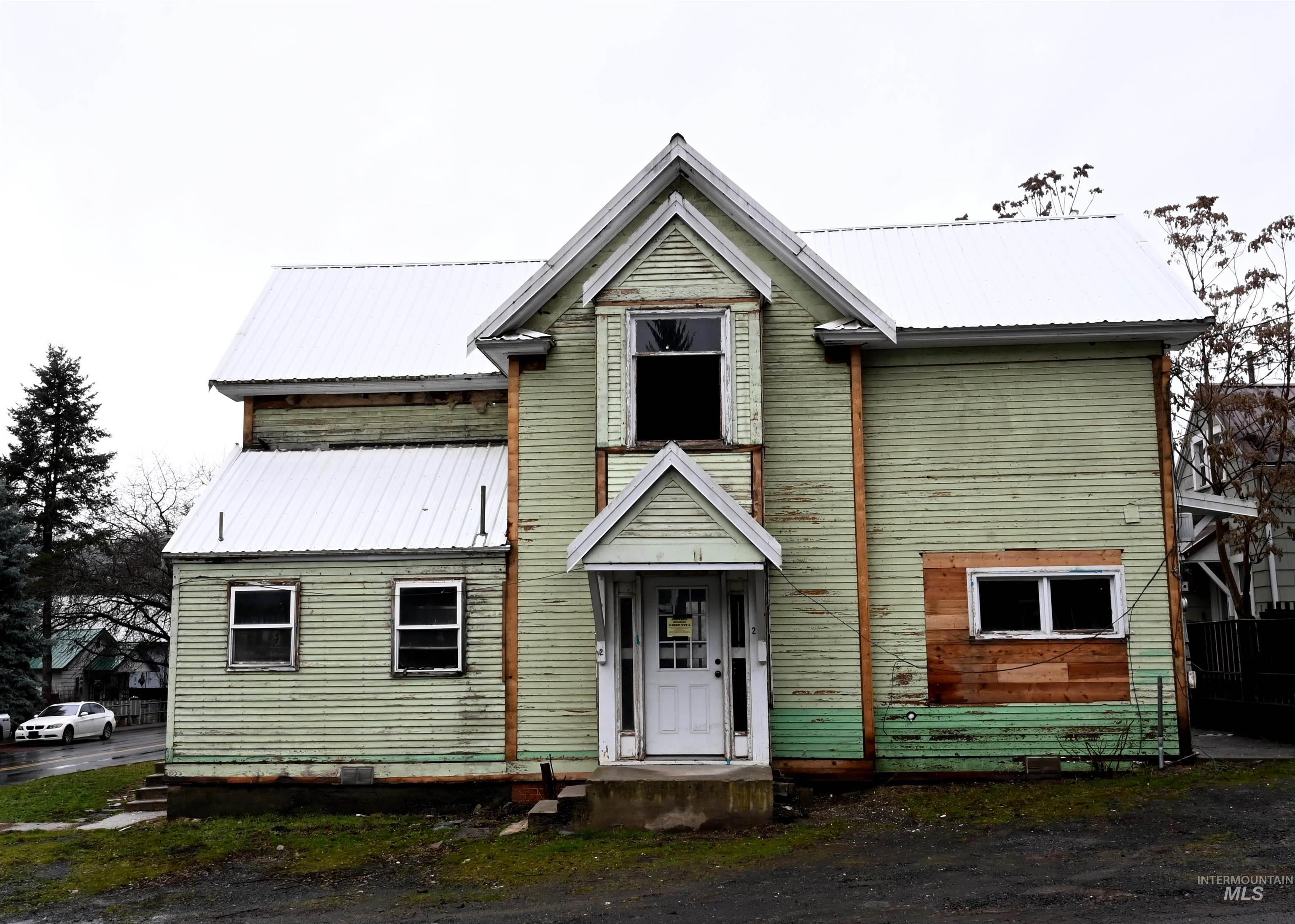 704 Riverside Avenue Orofino, ID 83544 - Photo 21 of 23 View of front of home featuring a metal roof