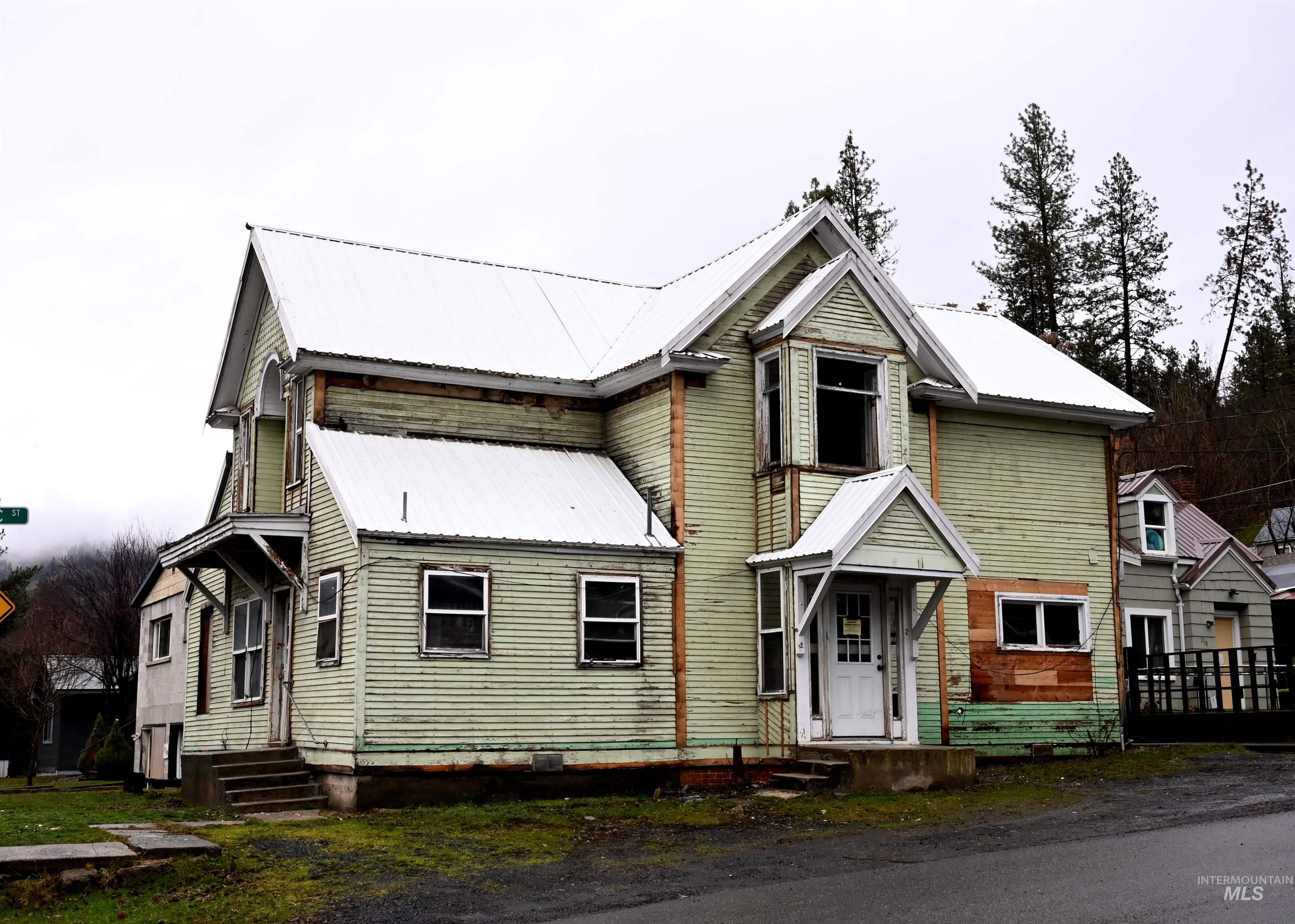 704 Riverside Avenue Orofino, ID 83544 - Photo 22 of 23 View of front of house featuring a metal roof and entry steps
