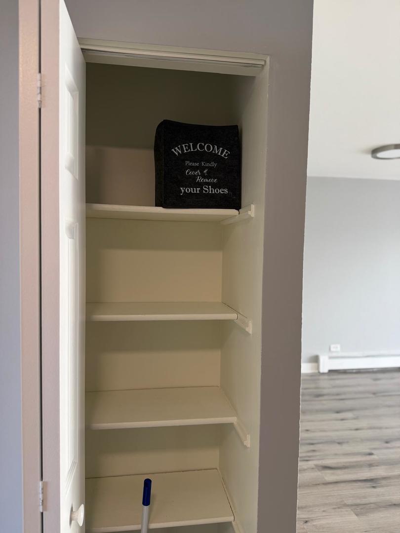 157 North Gregory Street, Unit 14 Aurora, IL 60504 - Photo 11 of 15 a close view of closet