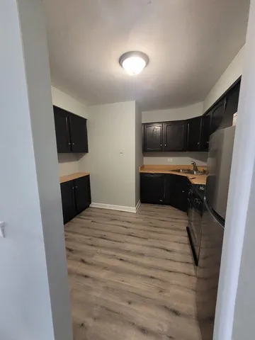 a view of kitchen and microwave