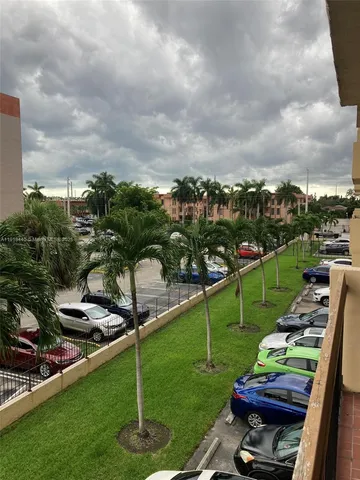 a view of a swimming pool with a lounge chairs