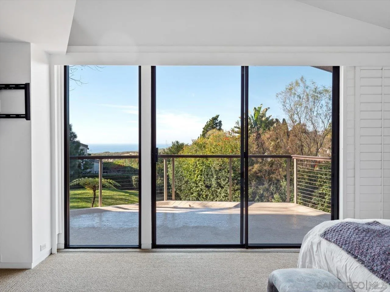 2640 Inyaha Lane La Jolla, CA 92037 - Photo 16 of 25 a view of a bedroom with a large window