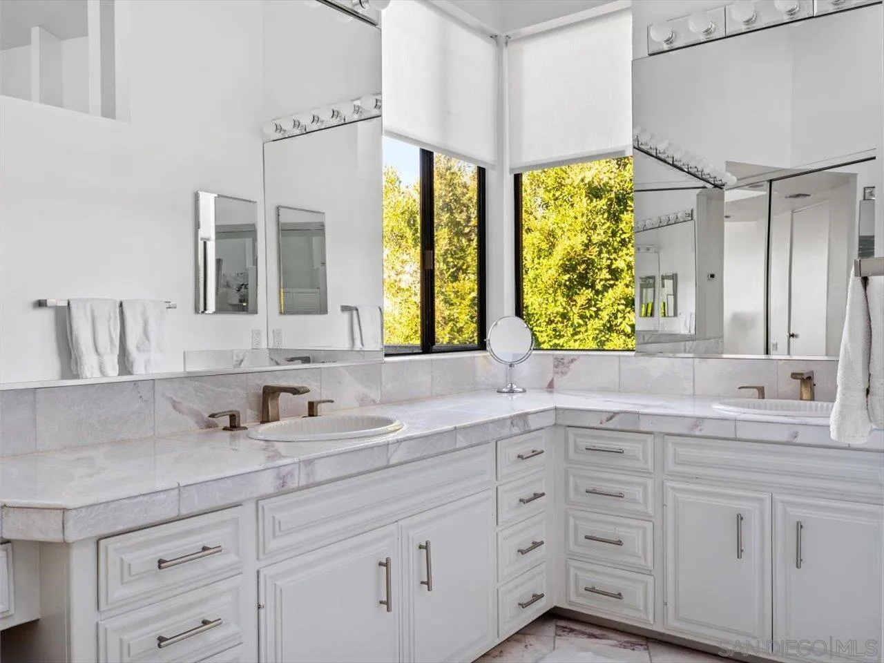 2640 Inyaha Lane La Jolla, CA 92037 - Photo 18 of 25 a bathroom with double vanity and a mirror