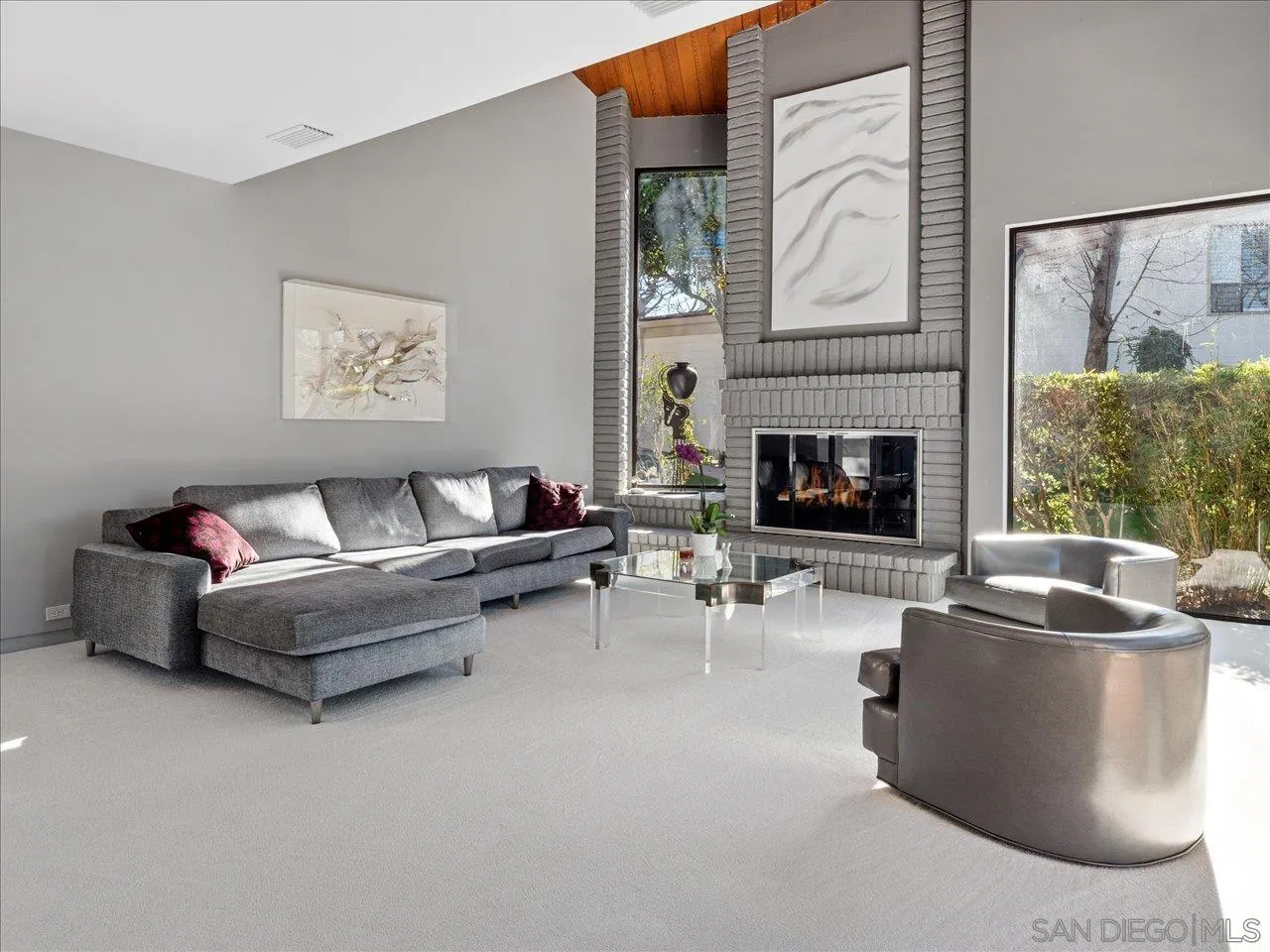 2640 Inyaha Lane La Jolla, CA 92037 - Photo 5 of 25 a living room with furniture and a fireplace