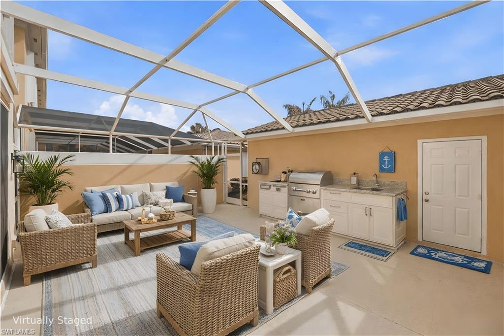8108 Josefa Way Naples, FL 34114 - Photo 16 of 49 Virtually Staged Patio with Outdoor Kitchen
