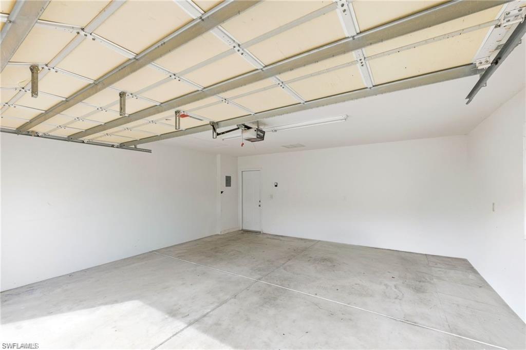 8108 Josefa Way Naples, FL 34114 - Photo 19 of 49 View of garage