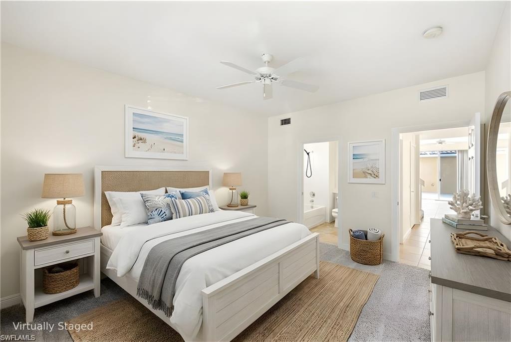 8108 Josefa Way Naples, FL 34114 - Photo 9 of 49 Virtually staged Bedroom on first Floor with own entry and access to an outdoor patio.