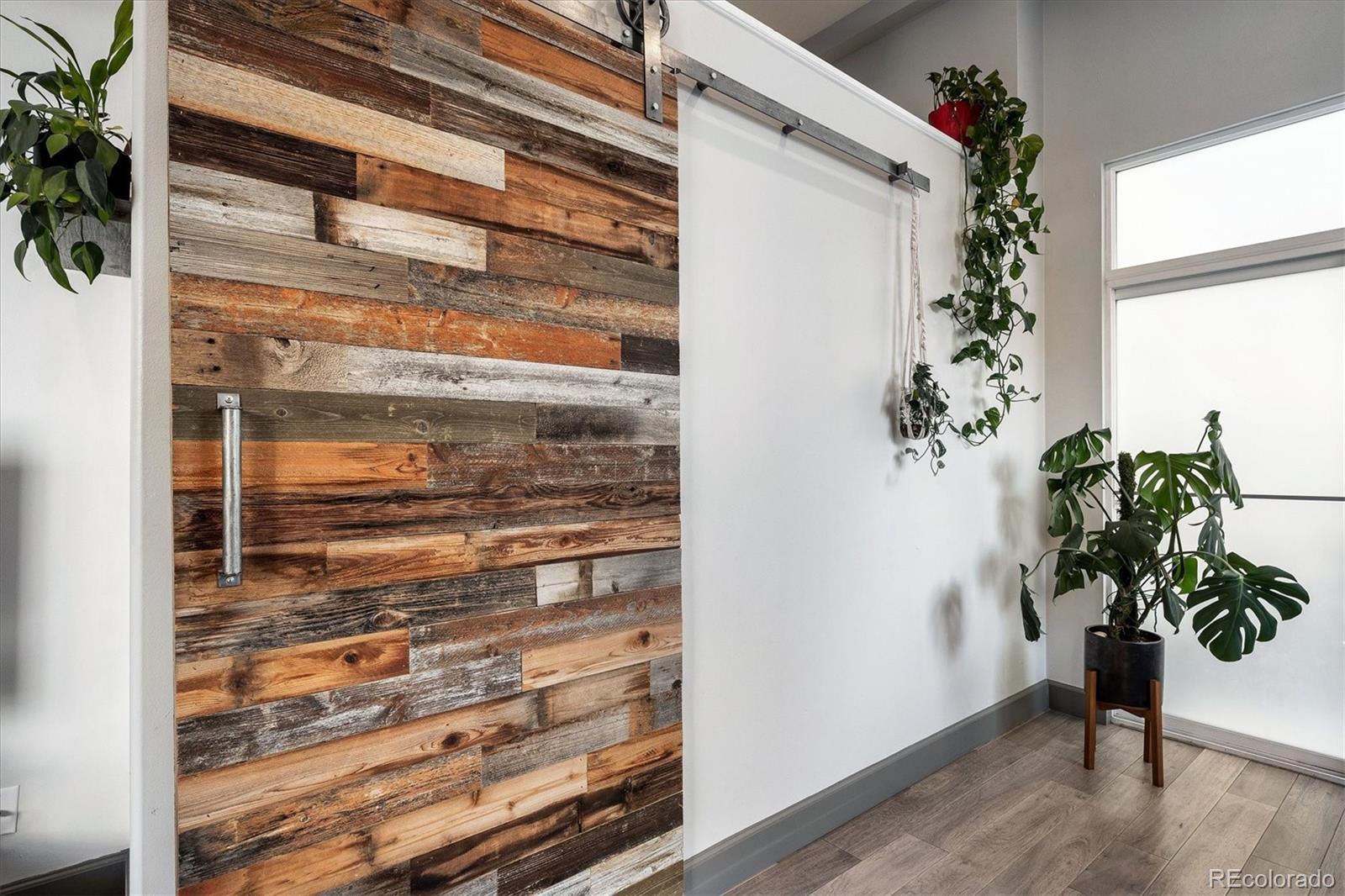 1521 Central Street, Unit 1D Denver, CO 80211 - Photo 14 of 27 a view of door with wooden floor