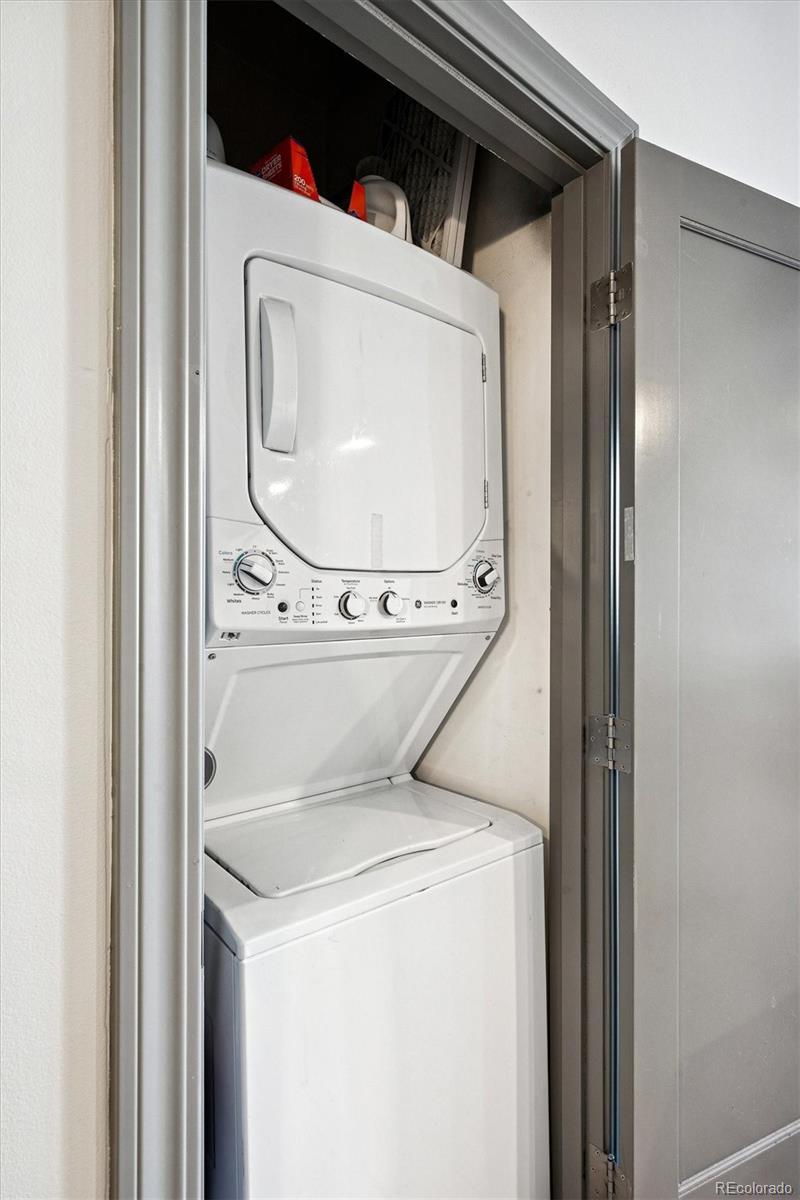 1521 Central Street, Unit 1D Denver, CO 80211 - Photo 18 of 27 a utility room with dryer and washer