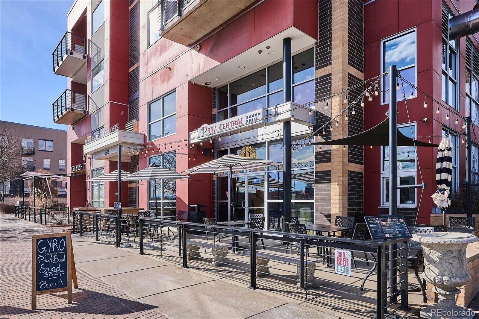 1521 Central Street, Unit 1D Denver, CO 80211 - Photo 22 of 27 a view of a building with sitting area