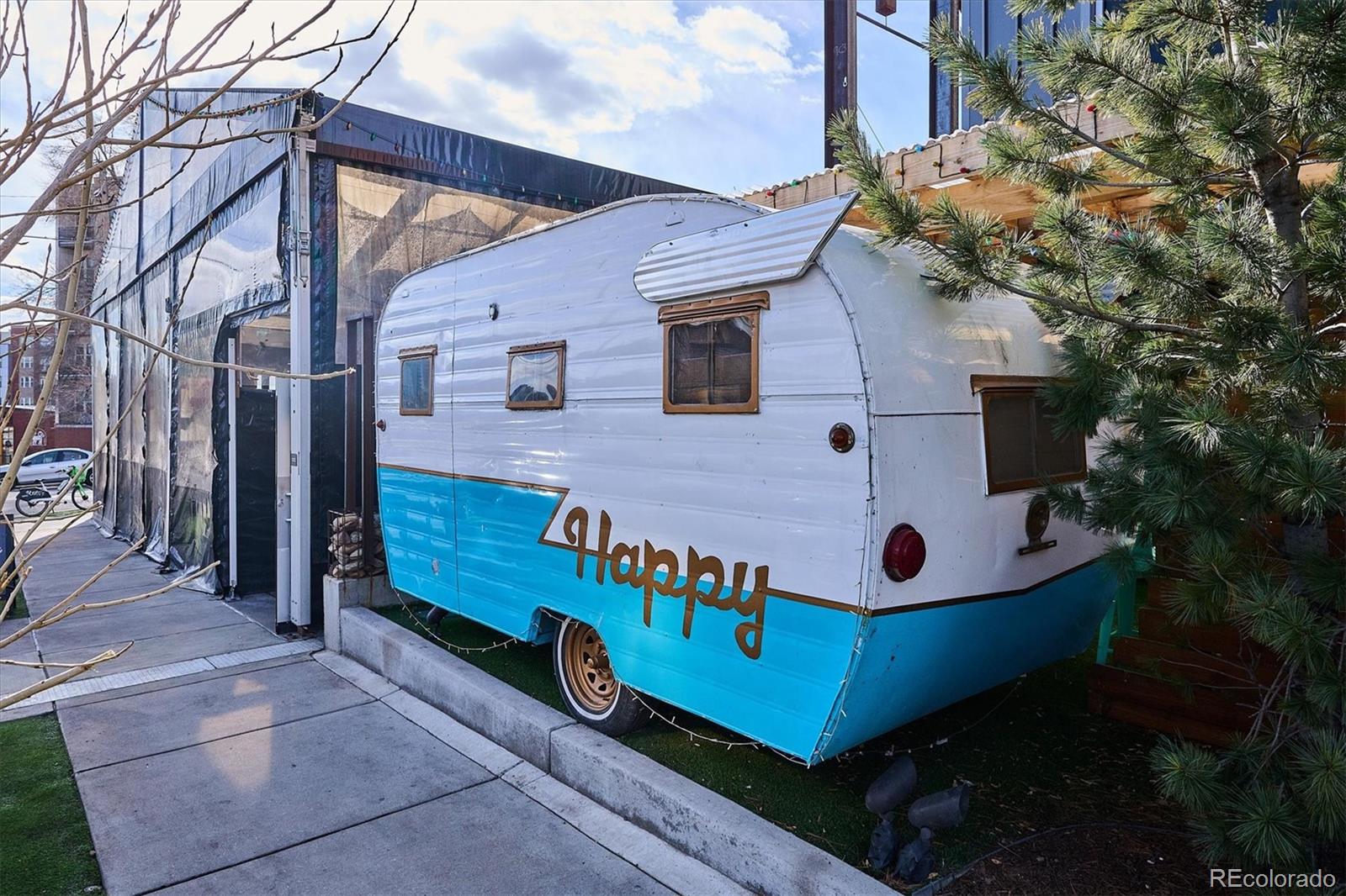 1521 Central Street, Unit 1D Denver, CO 80211 - Photo 25 of 27 a front view of a house with a yard