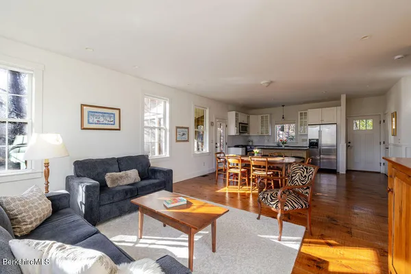 a living room with furniture and a table