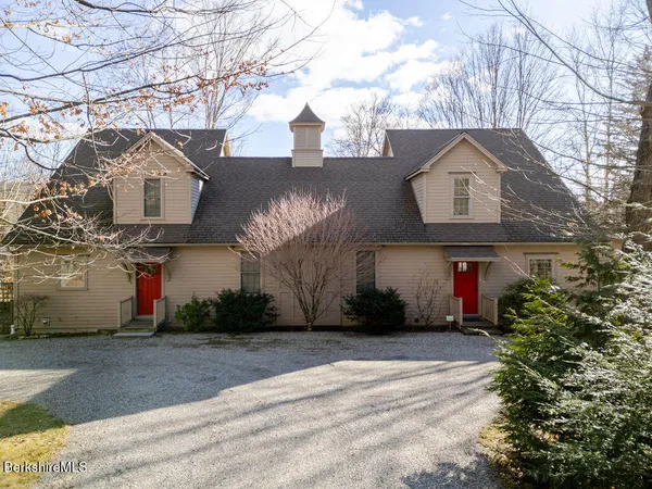 a front view of house with a yard