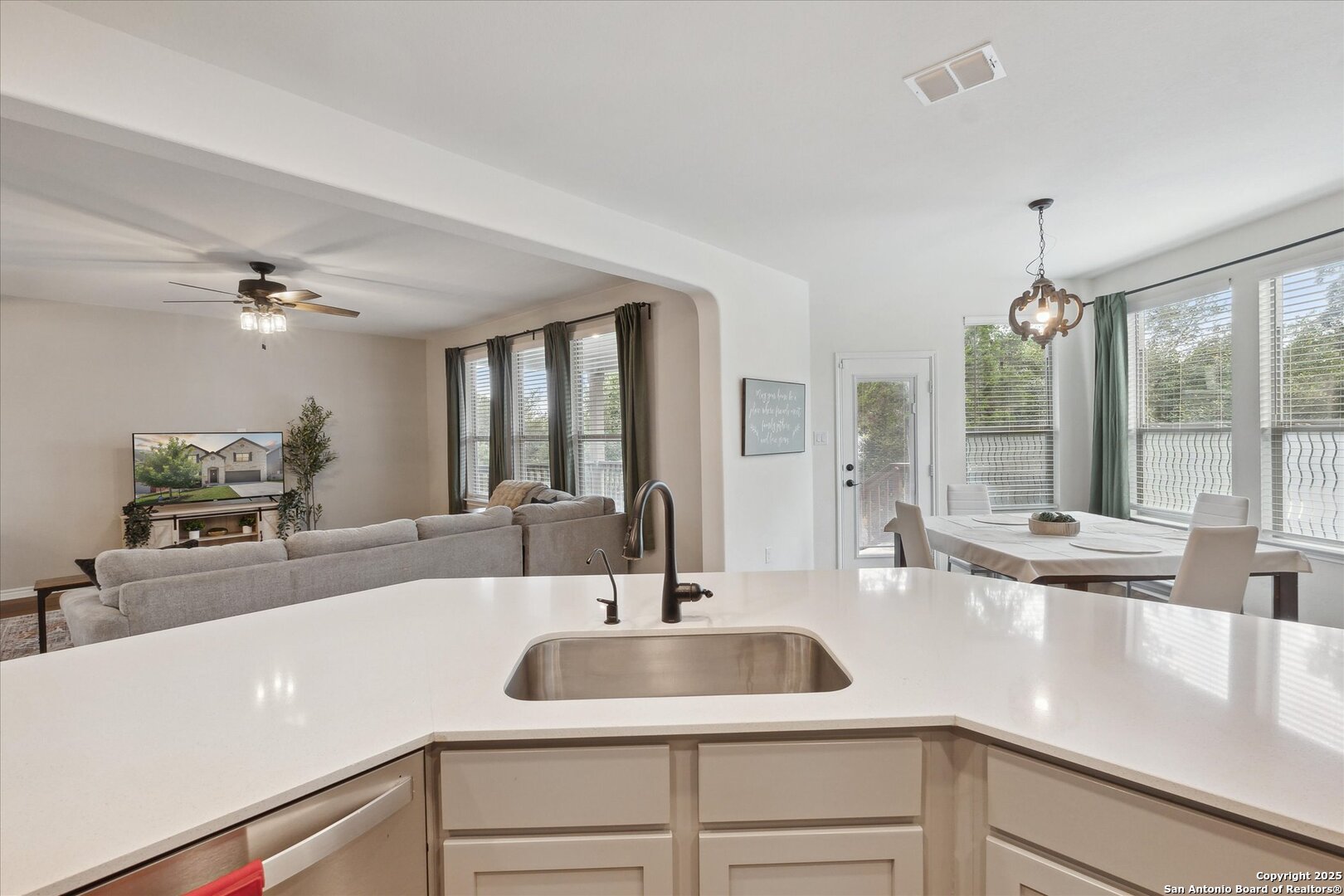 11314 Hill Top Bend Helotes, TX 78023 - Photo 18 of 49 a view living room with furniture and large windows