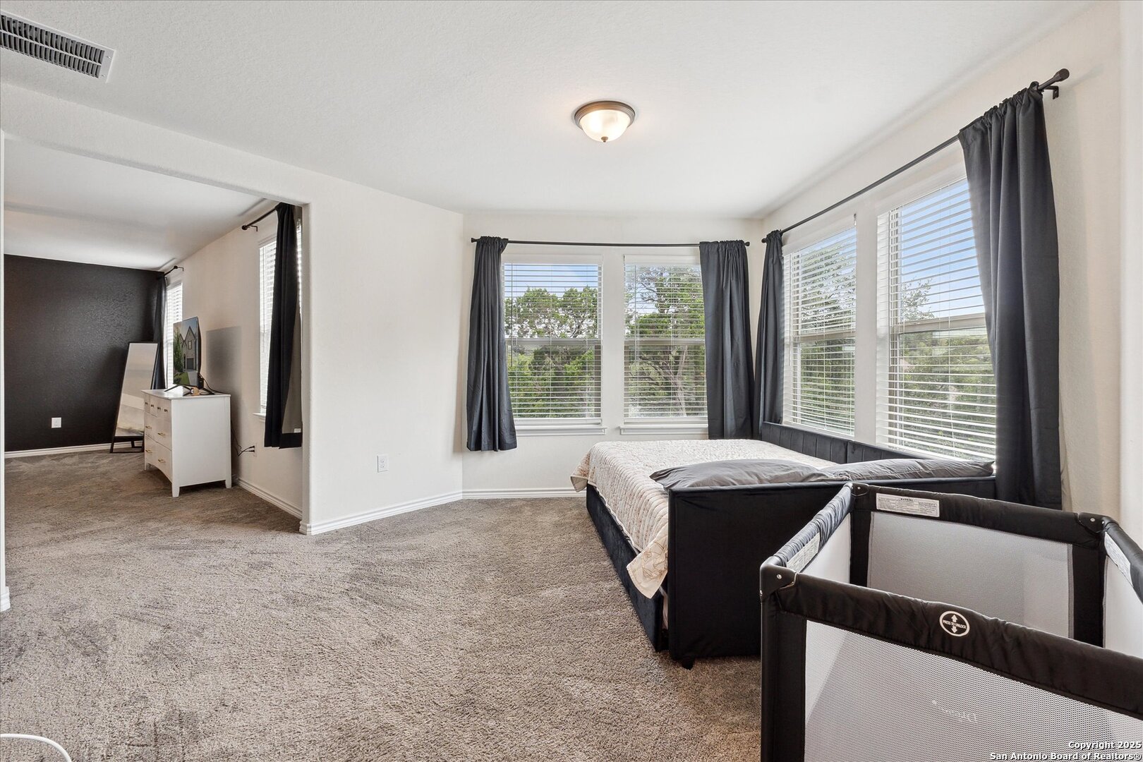 11314 Hill Top Bend Helotes, TX 78023 - Photo 36 of 49 a view of a livingroom with furniture and window