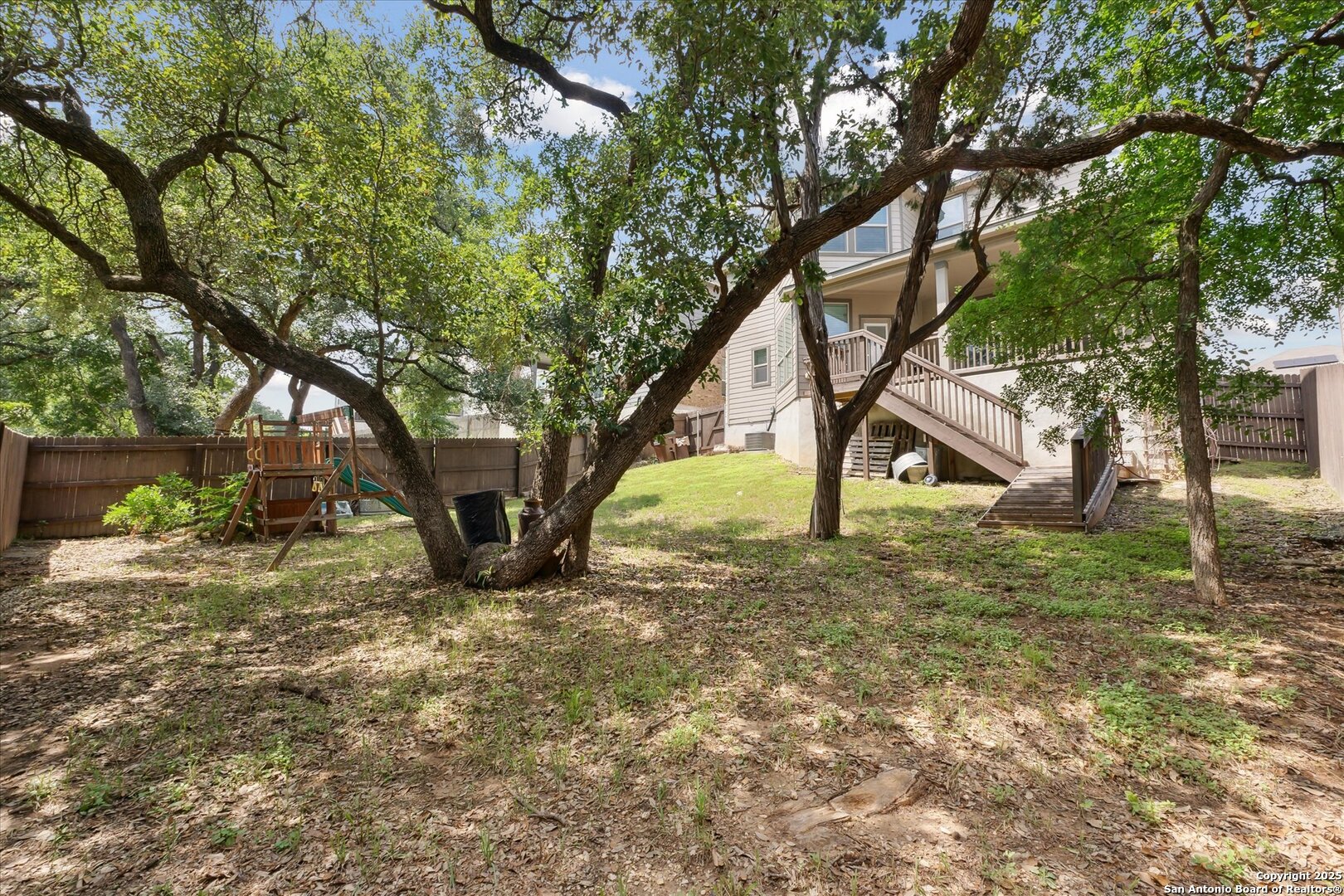 11314 Hill Top Bend Helotes, TX 78023 - Photo 45 of 49 a view of outdoor space with trees