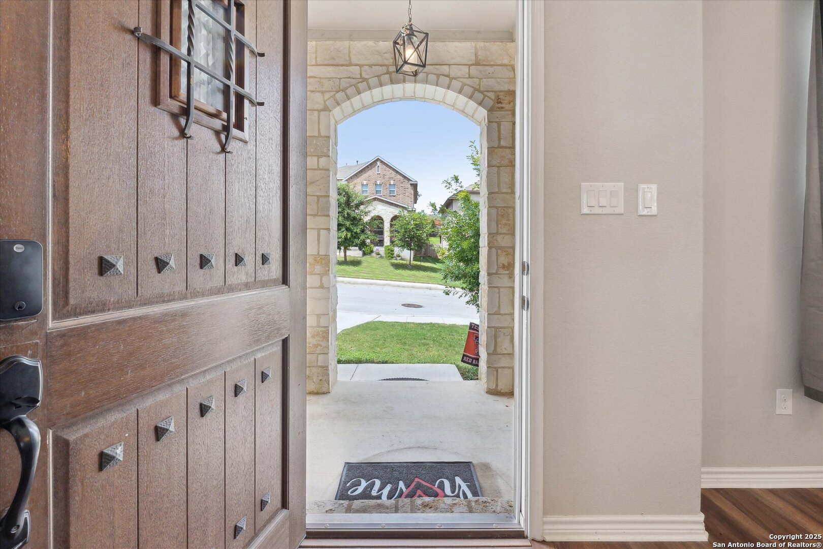 11314 Hill Top Bend Helotes, TX 78023 - Photo 6 of 49 a view of front door