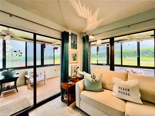 a bathroom with a sink mirror and vanity