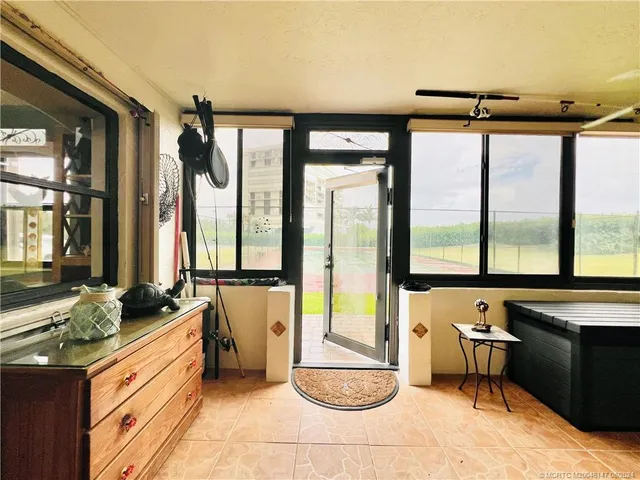 a view of storage and utility room with washer and dryer