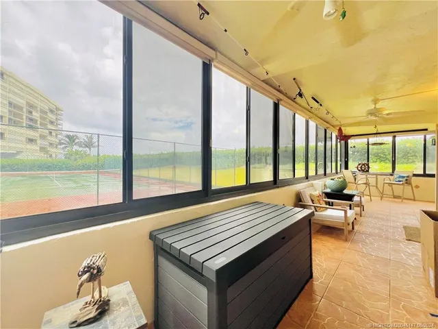 an aerial view of a house with a garden