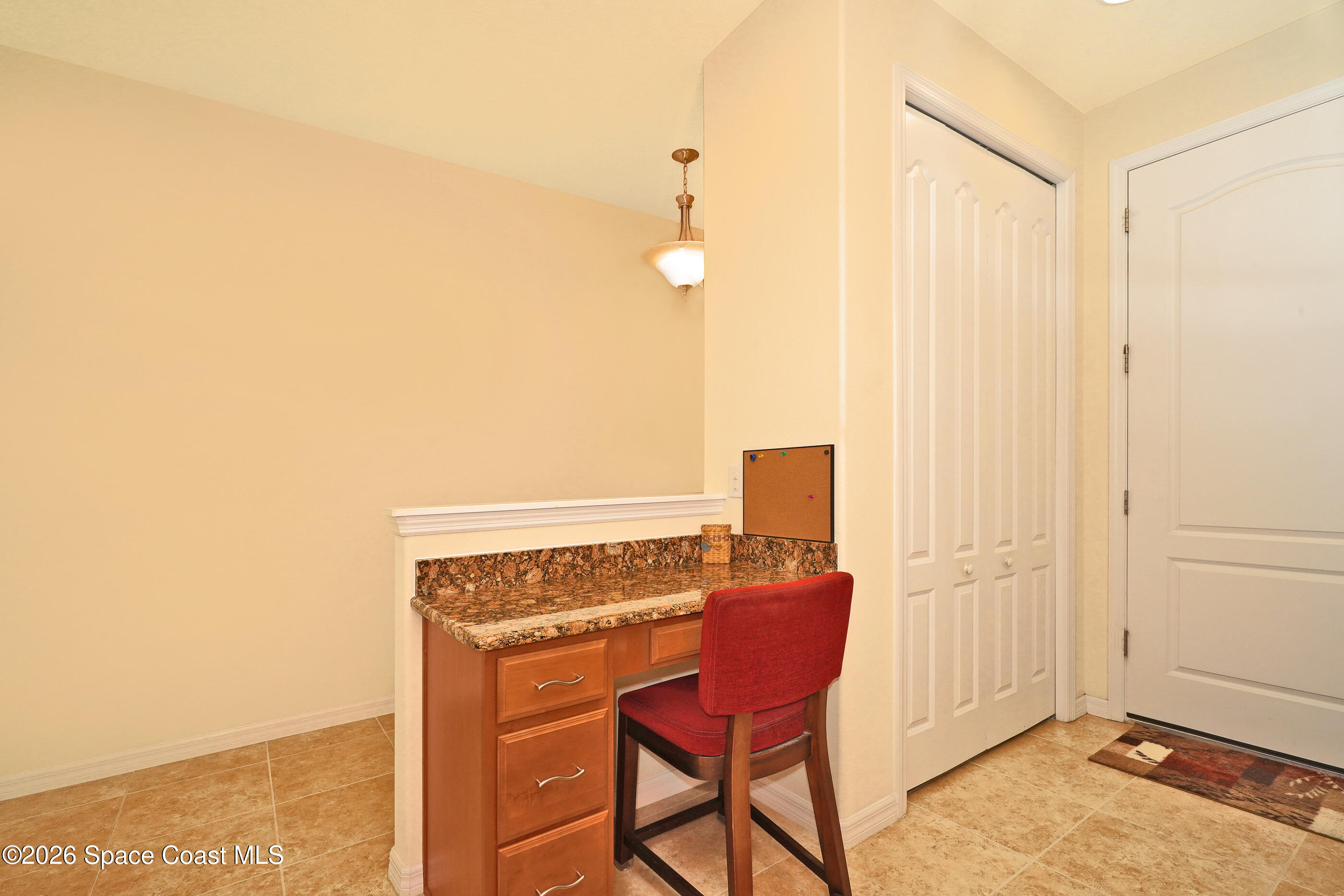 7170 Ralston Street Melbourne, FL 32940 - Photo 70 of 77 Kitchen has pantry and Work Station
