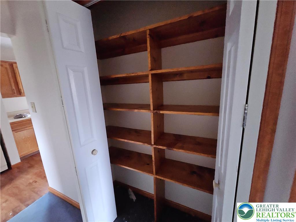 5817 Werleys Corner Road, Unit B New Tripoli, PA 18066 - Photo 13 of 16 a view of walk in closet with empty racks