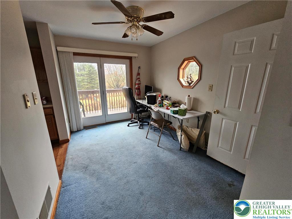 5817 Werleys Corner Road, Unit B New Tripoli, PA 18066 - Photo 6 of 16 a living room with furniture and a window