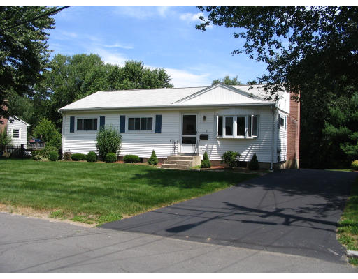 9 Whittemore Road Framingham, MA 01701 - Photo 1 of 15 a front view of house with yard and green space