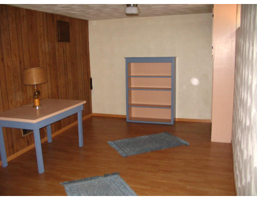 9 Whittemore Road Framingham, MA 01701 - Photo 15 of 15 a view of a room with a furniture and wooden floor