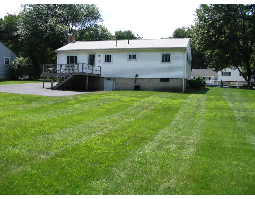 9 Whittemore Road Framingham, MA 01701 - Photo 2 of 15 a view of a house with backyard and garden