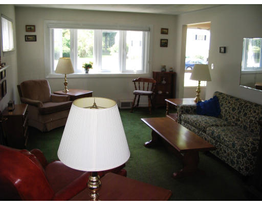 9 Whittemore Road Framingham, MA 01701 - Photo 6 of 15 a living room with furniture and a large window