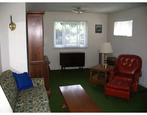 9 Whittemore Road Framingham, MA 01701 - Photo 7 of 15 a living room with furniture rug and a window