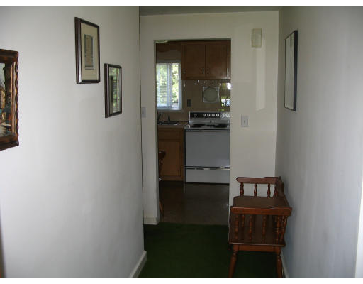 9 Whittemore Road Framingham, MA 01701 - Photo 8 of 15 a view of hallway with furniture and wooden floor