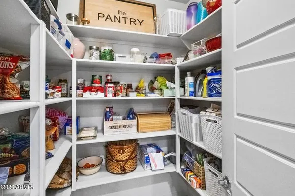 a spacious bathroom with a double vanity sink mirror and double