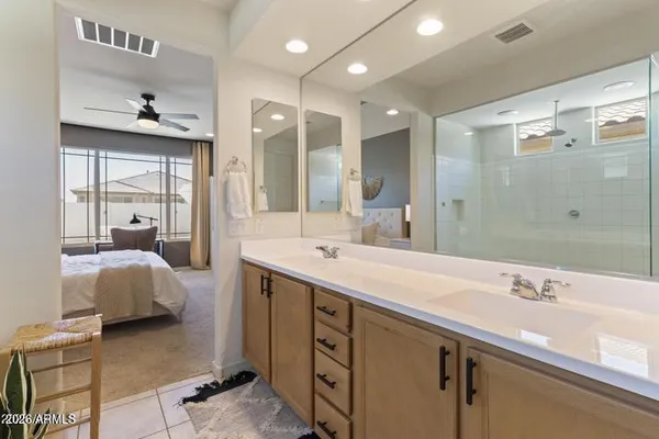 an aerial view of a house with a lake view