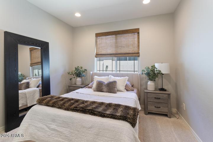 22849 East Marsh Road Queen Creek, AZ 85142 - Photo 24 of 38 a bedroom with a bed and a window
