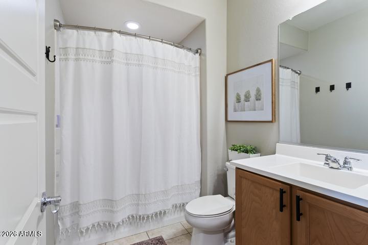22849 East Marsh Road Queen Creek, AZ 85142 - Photo 25 of 38 a bathroom with a sink toilet and shower