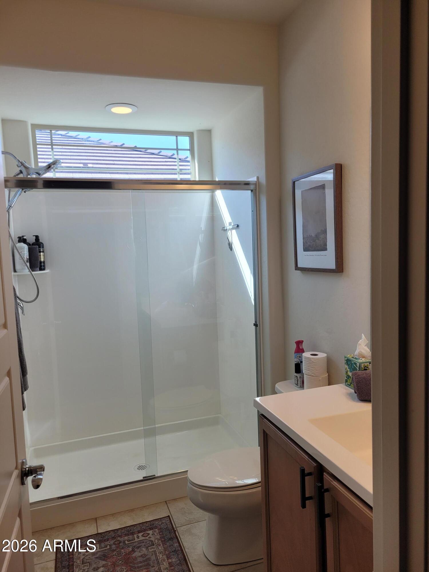 22849 East Marsh Road Queen Creek, AZ 85142 - Photo 28 of 38 a bathroom with a shower and a toilet
