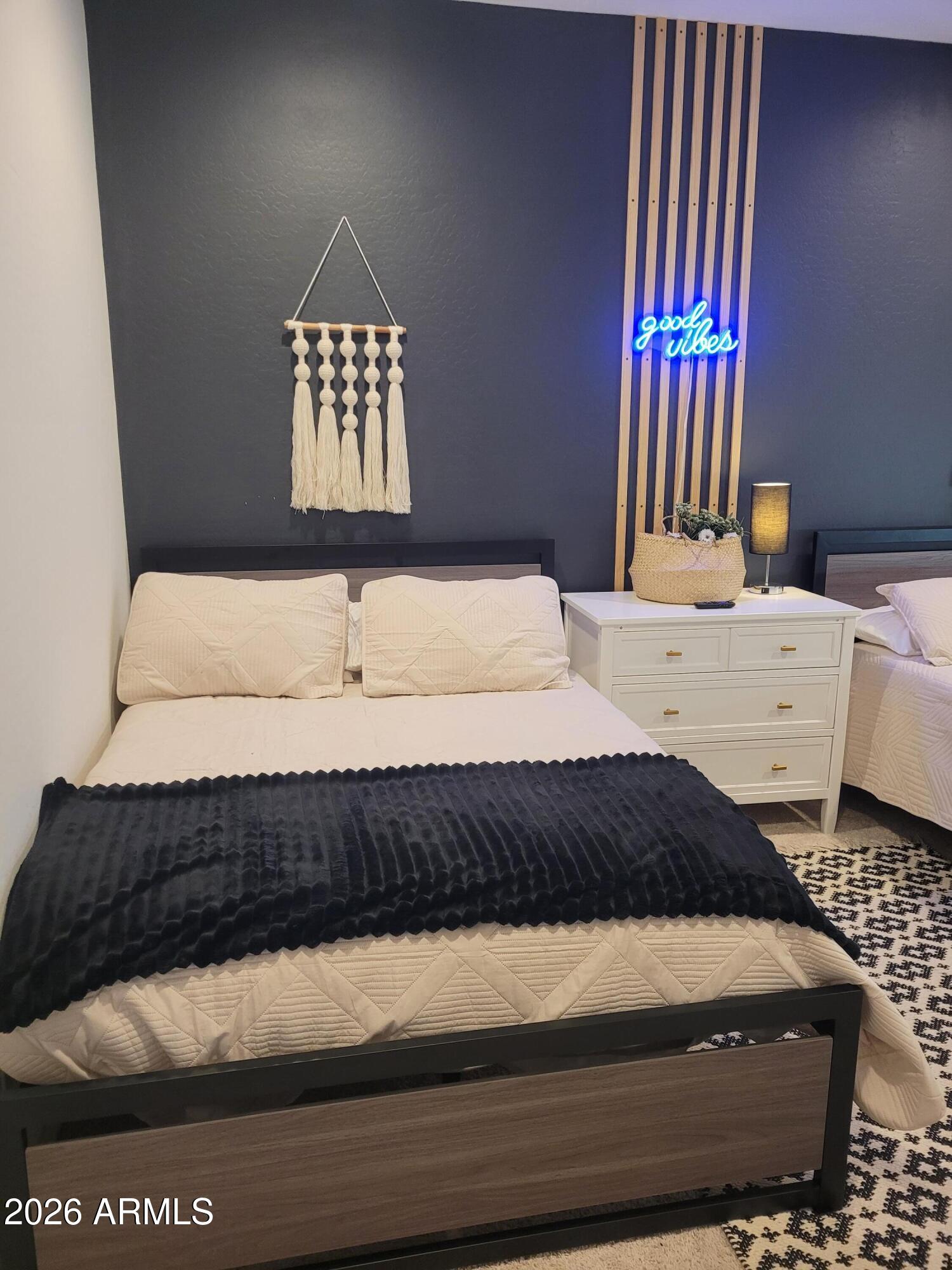 22849 East Marsh Road Queen Creek, AZ 85142 - Photo 30 of 38 a bedroom with a bed and a window