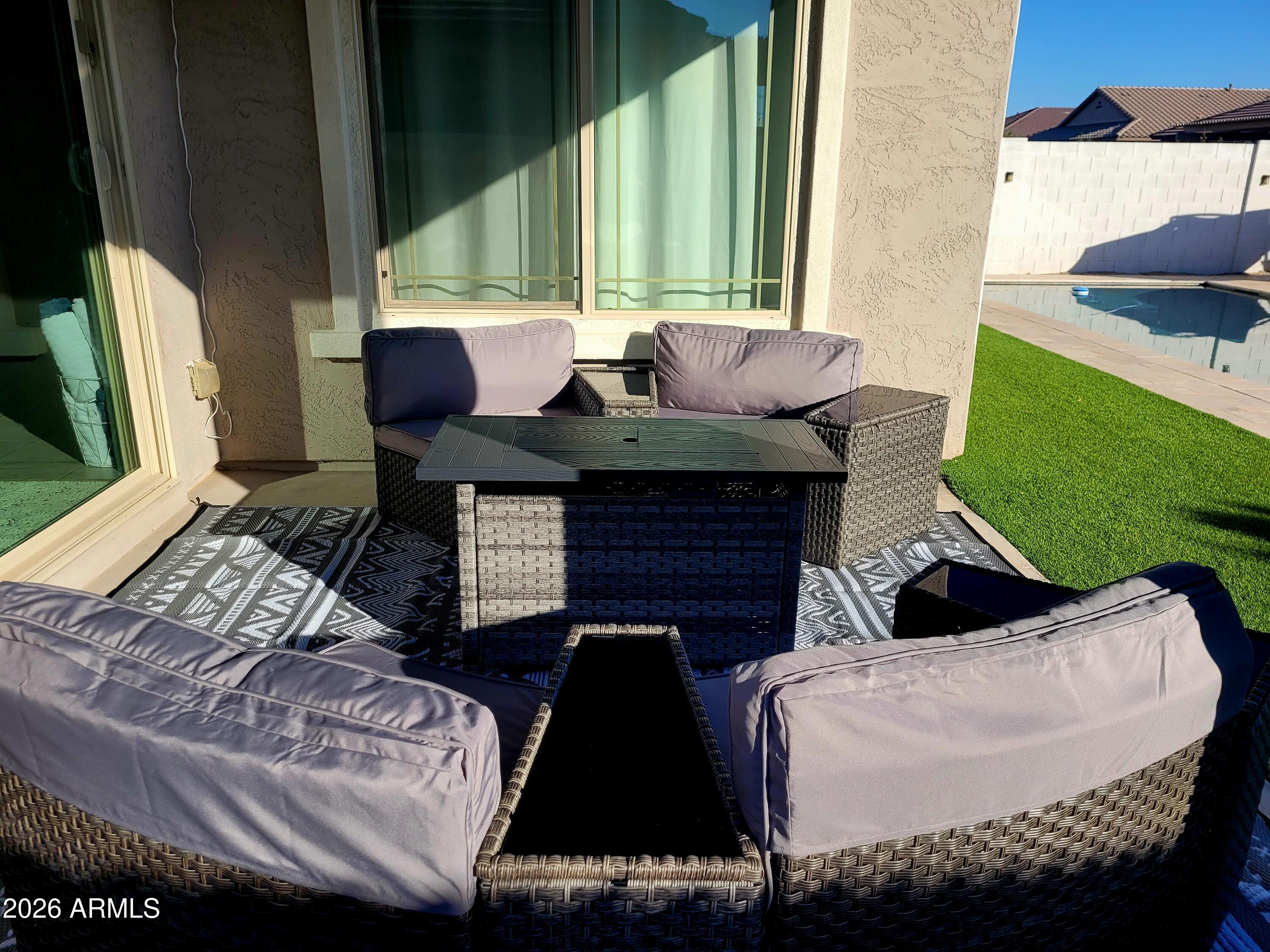 22849 East Marsh Road Queen Creek, AZ 85142 - Photo 5 of 38 a bed sitting in a bedroom next to a window with outer view