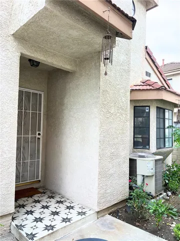a front view of a house with a wooden floor