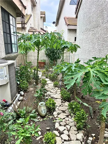 a backyard of a house with lots of green space