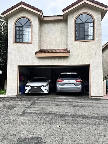 a car parked in front of a house