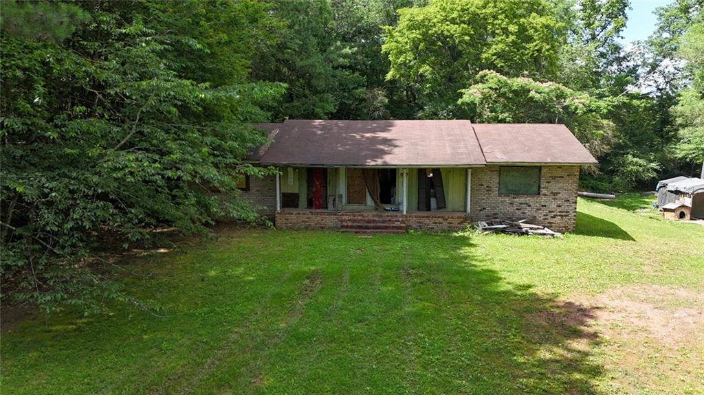 120 Foothill Drive Dalton, GA 30720 - Photo 29 of 55 a front view of a house with a garden