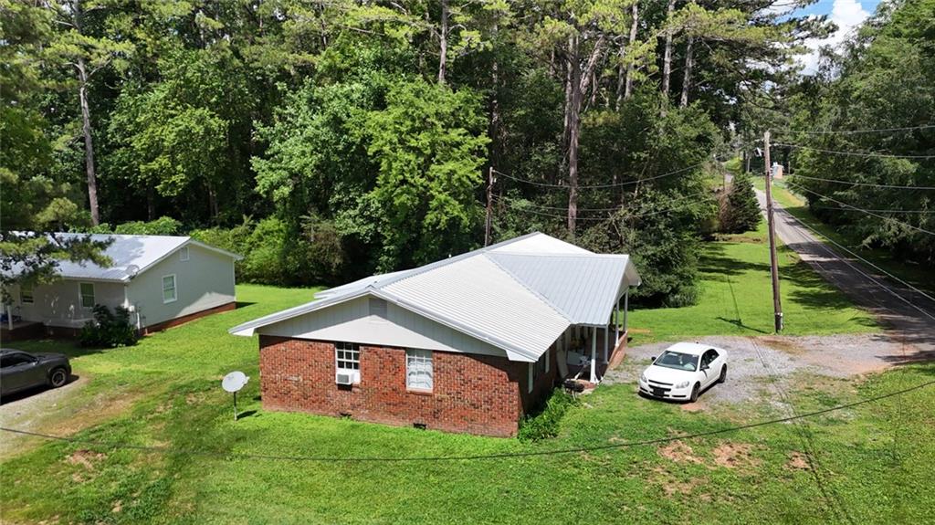 120 Foothill Drive Dalton, GA 30720 - Photo 31 of 55 a view of a chairs and table in backyard