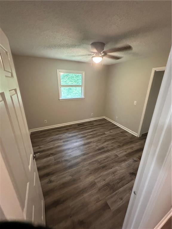 120 Foothill Drive Dalton, GA 30720 - Photo 42 of 55 wooden floor in an empty room with a window