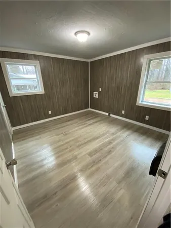 a bathroom with a toilet and a vanity