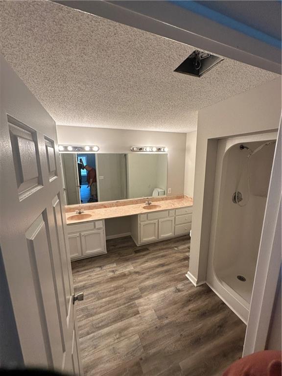 120 Foothill Drive Dalton, GA 30720 - Photo 48 of 55 a bathroom with a double vanity sink toilet and shower