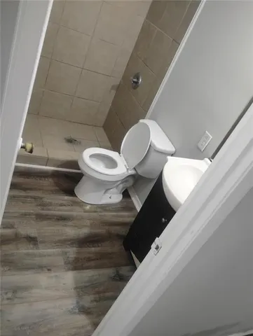 a kitchen with stainless steel appliances a refrigerator and a stove top oven